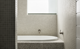 Minimal tiled bathroom with bathtub in Balgowlah residential architecture project 