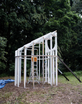 Timber frame structure during construction of architectural installation 