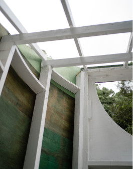 Interior roof structure framing sky in architectural installation pavilion 